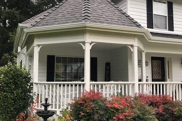 White curved gutters on residential home in Portland, OR