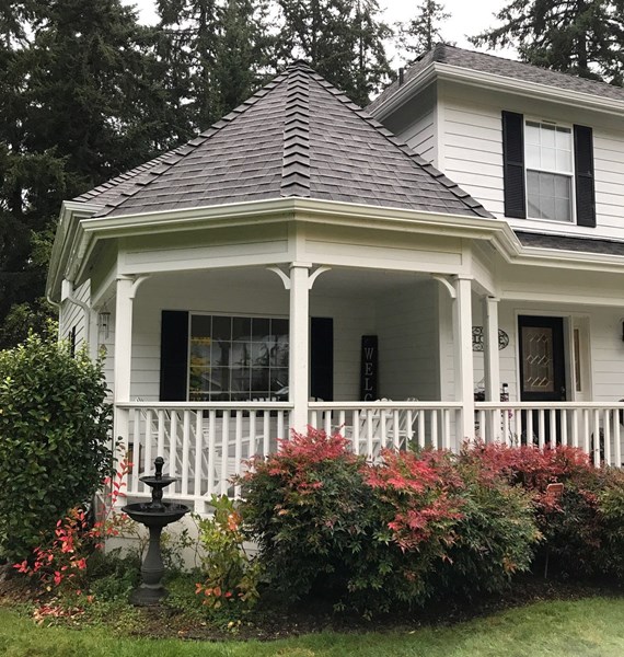 White curved gutters on residential home in Portland, OR