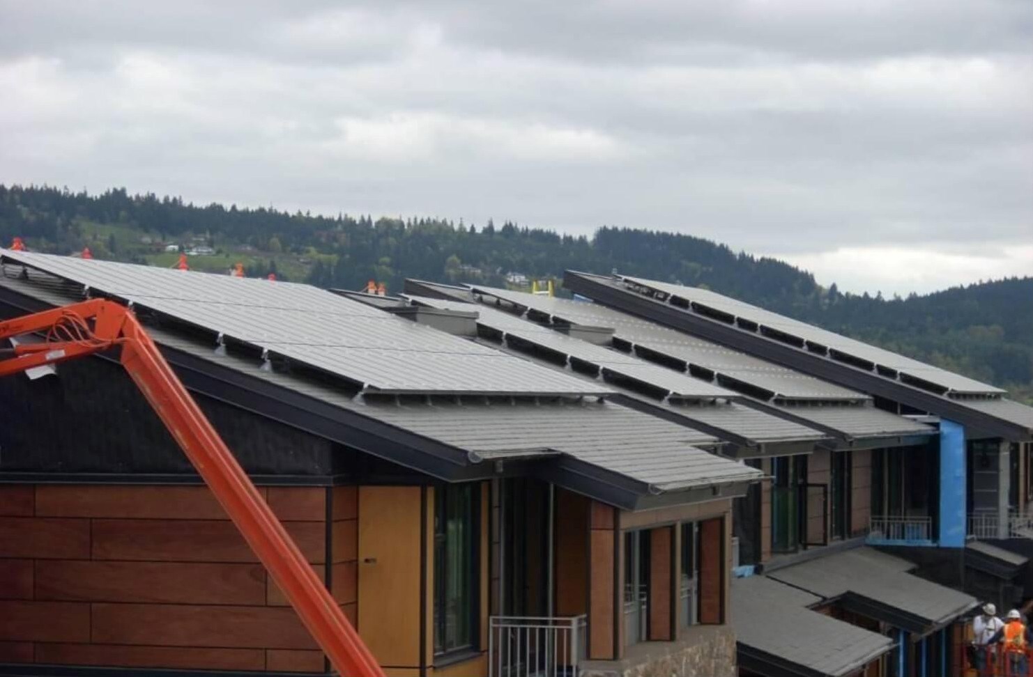 Steep-slope metal roof on appartment building