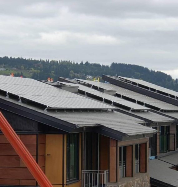 Steep-slope metal roof on appartment building