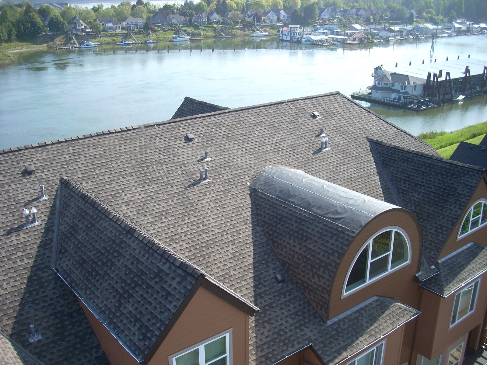 Commercial asphalt roofing on multi-family home in Portland, OR