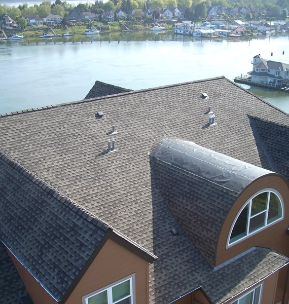 Commercial asphalt roofing on multi-family home in Portland, OR