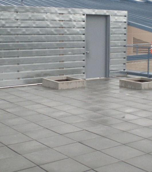 Commercial flat roof repair on industrial building in Portland, OR