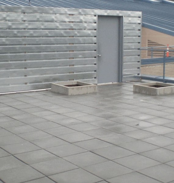 Commercial flat roof repair on industrial building in Portland, OR