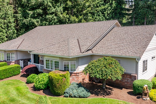 New, brown asphalt roof on one-story residential home in Portland, OR