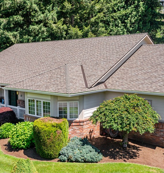 New, brown asphalt roof on one-story residential home in Portland, OR