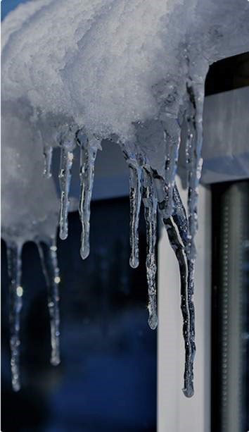 Icicles on gutters and roof